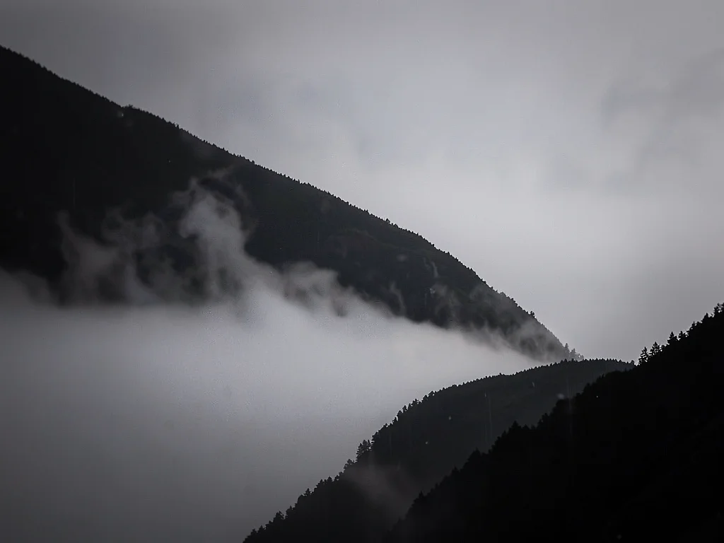 Single ridge silhouette against gray gradient