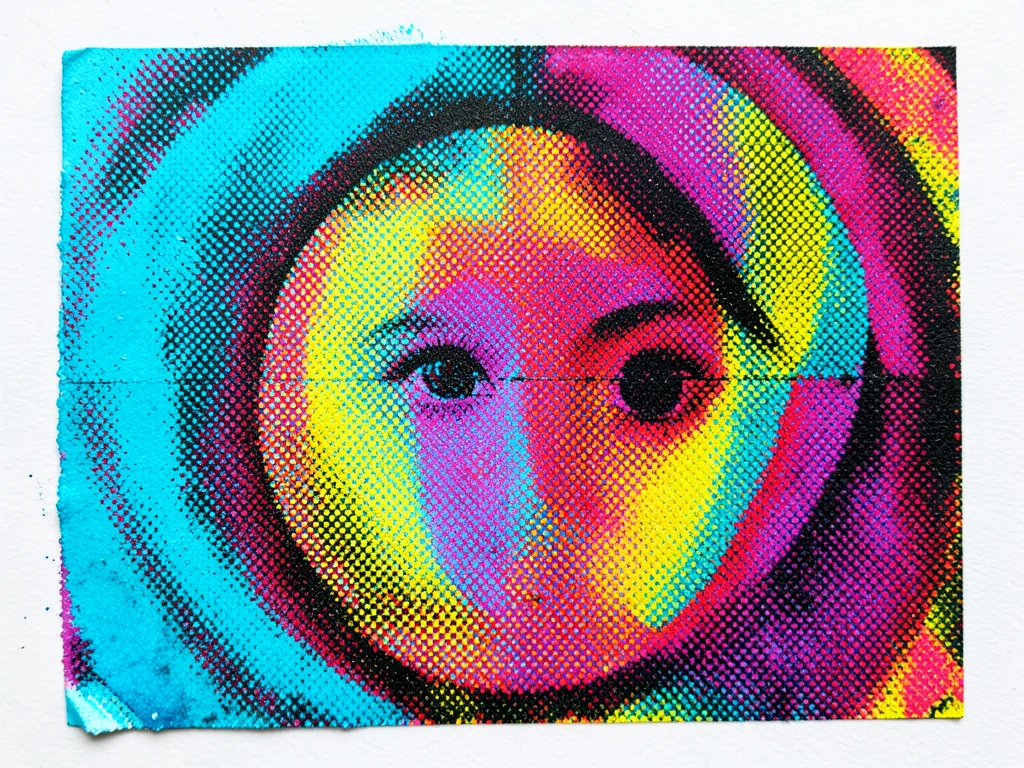 Misregistered four-color process, each plate slightly offset creating colored sh