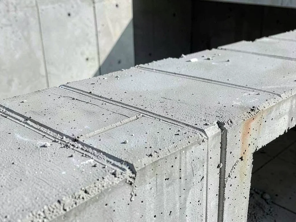 Concrete formwork marks visible on surface