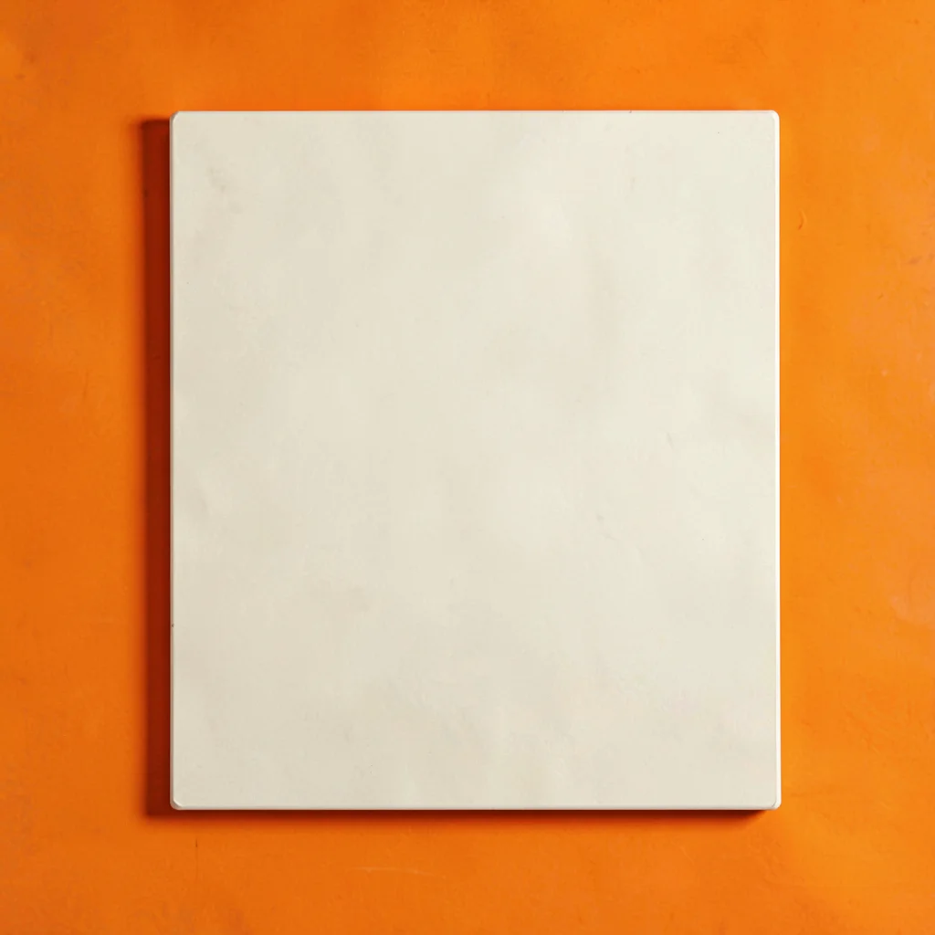 single matte-cream calf-stretcher slant-board top-down on a saturated marigold b