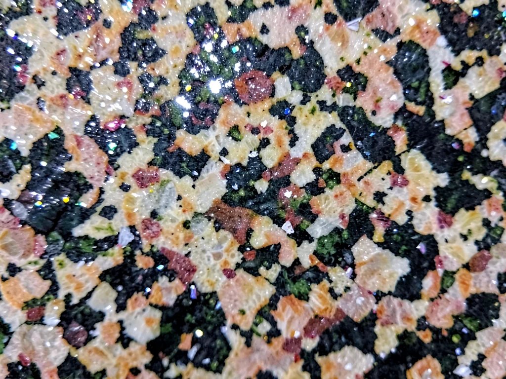 Mica flakes catching light as sparkle