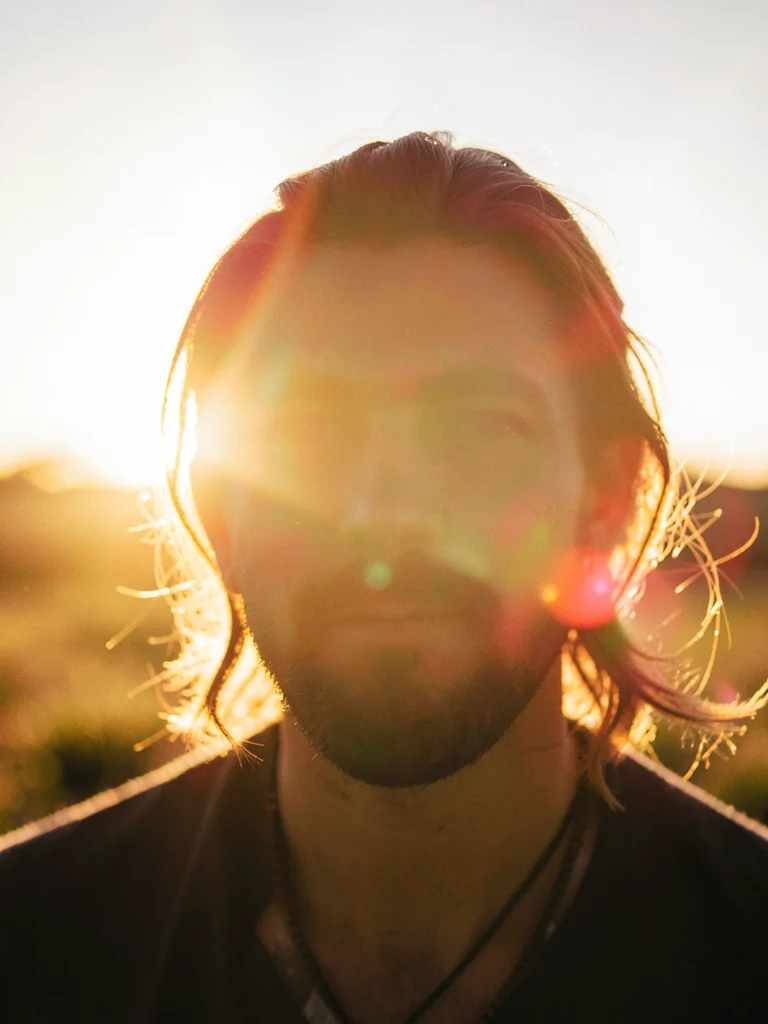Portrait into sun with flare