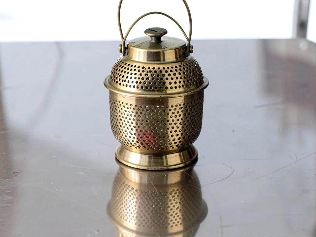 Brass lantern with perforated patterns