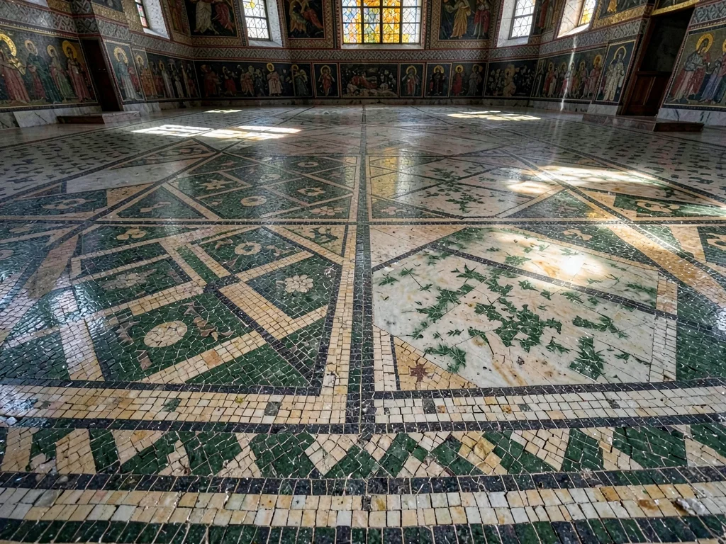 A broad view of a Byzantine church floor — intricate geometric patterns in green