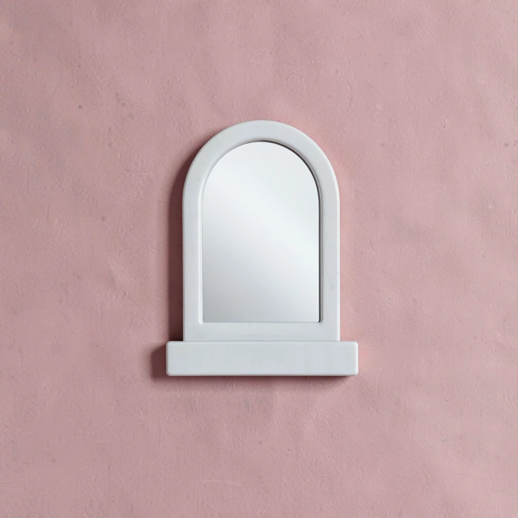 Blockcolor catalog motif of a vanity mirror as a small flat shape on dusty rose 