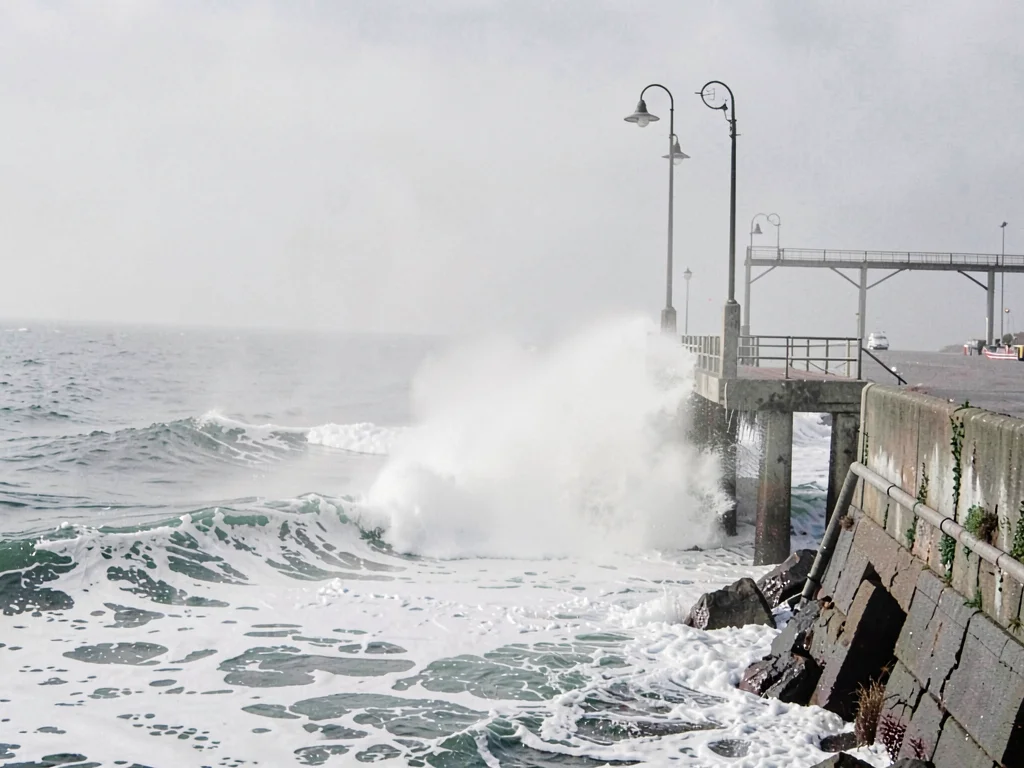 Pier end lost in spray