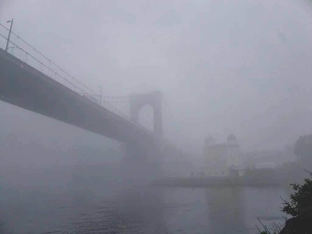 Bridge disappearing in smog
