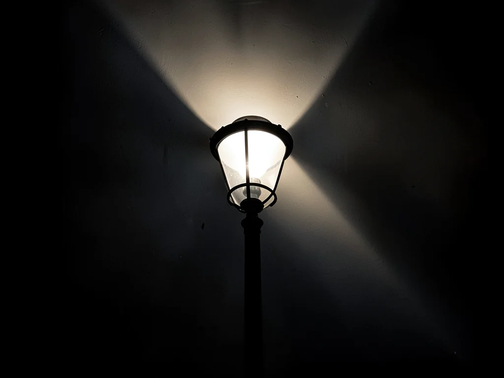 Street lamp creating cone of visibility