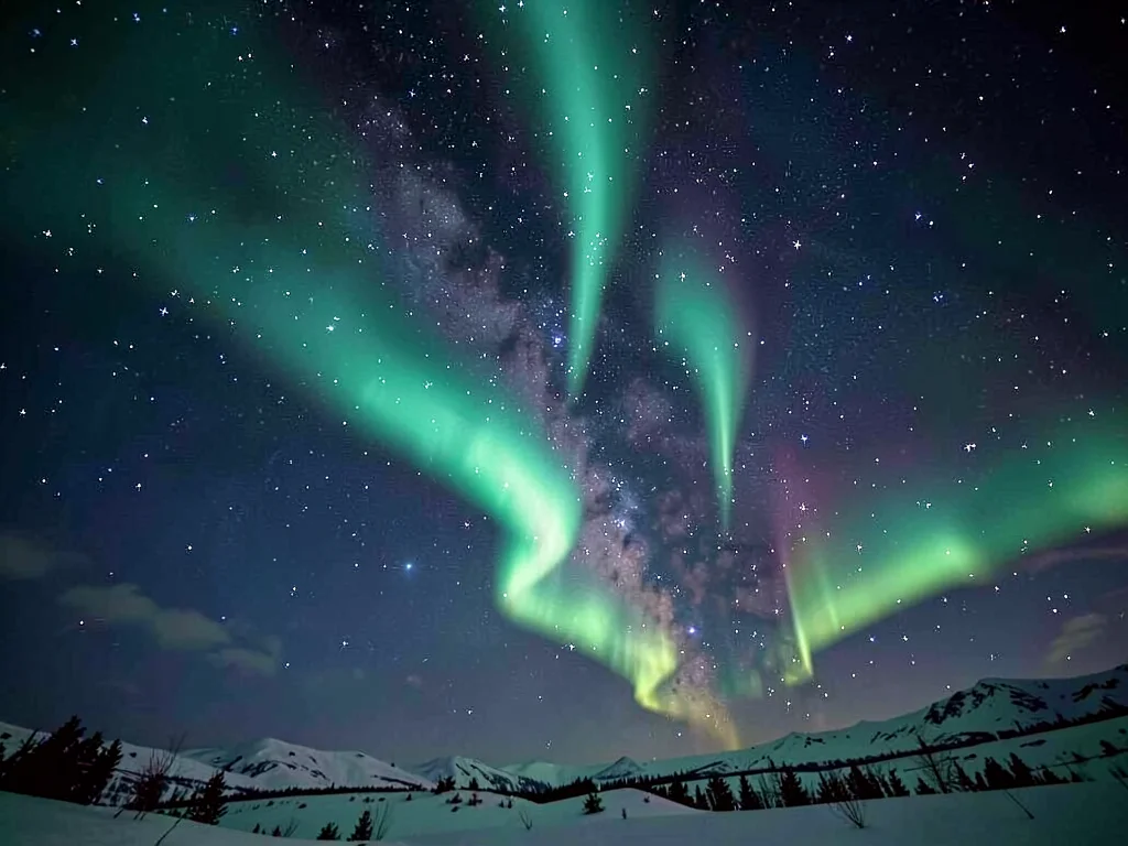 Aurora mixing with Milky Way in dark sky