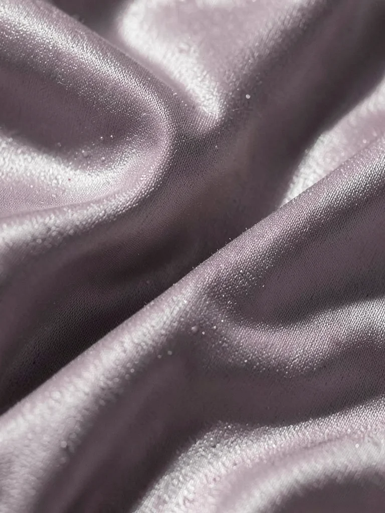 Silk fabric with liquid smooth drape catching light