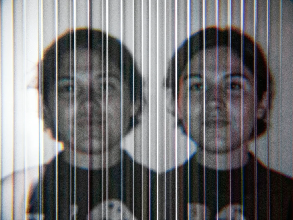 Lenticular animation frame caught between states, motion blur of the optical kin