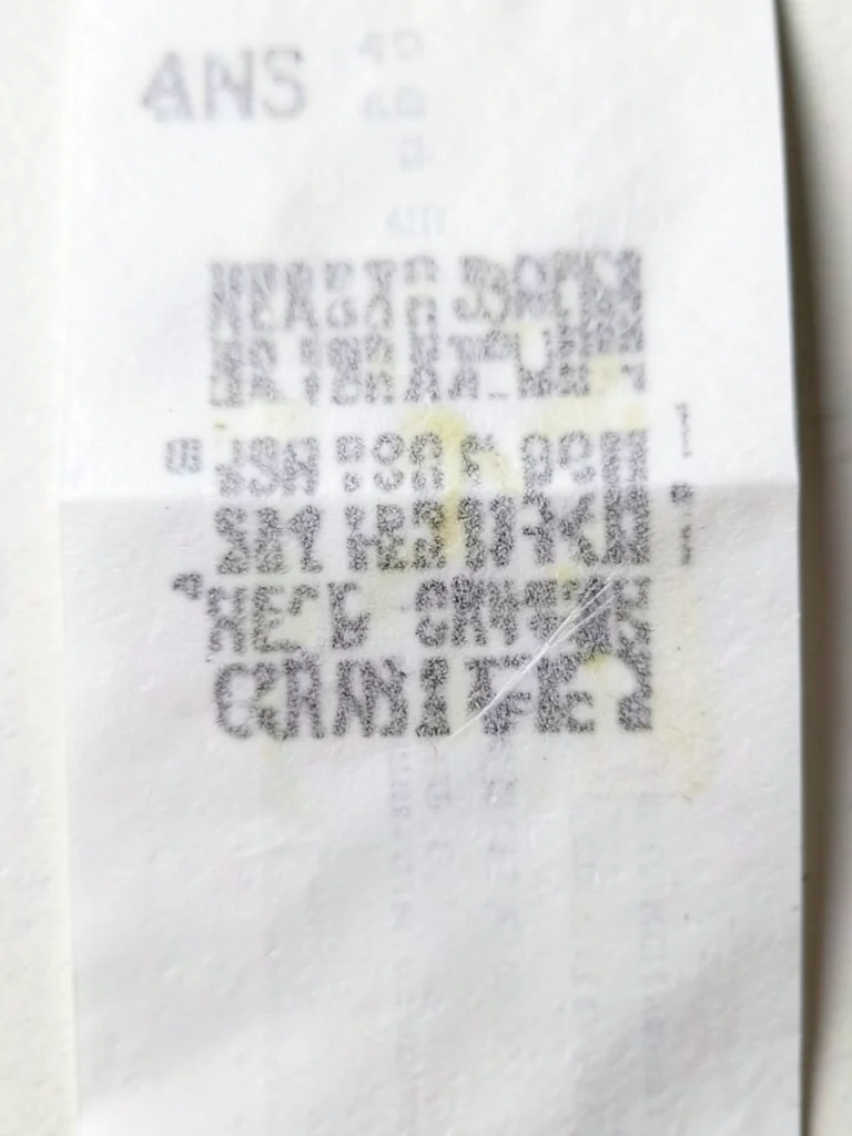 Receipt paper printout of candy bulk order for trick-or-treaters
