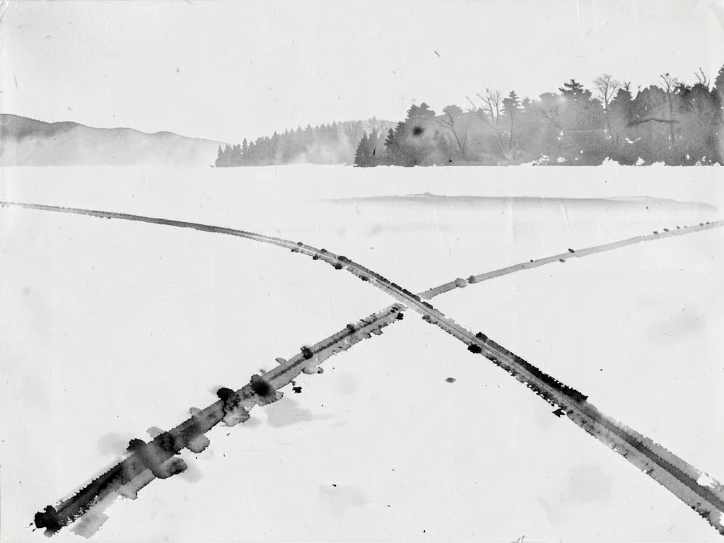 Snow field with single track crossing