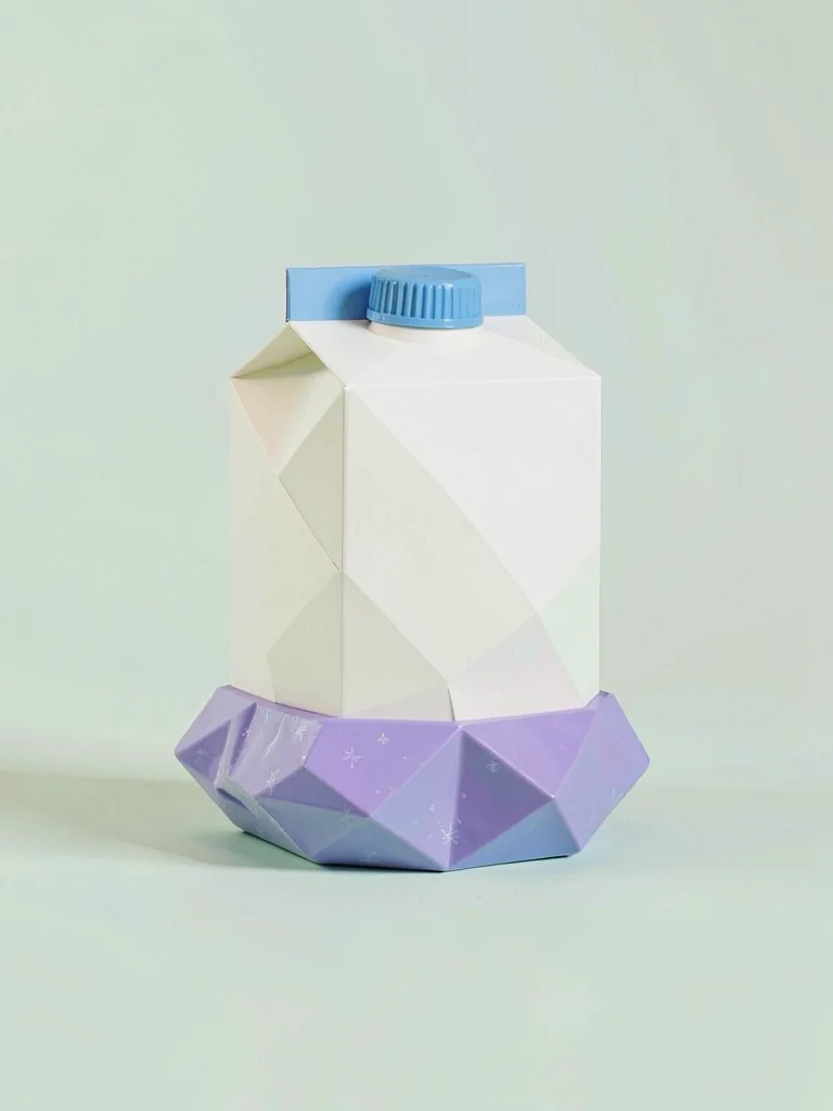 Boxed cream lowpoly milk carton with a sky-blue spout fold and chunky lavender b