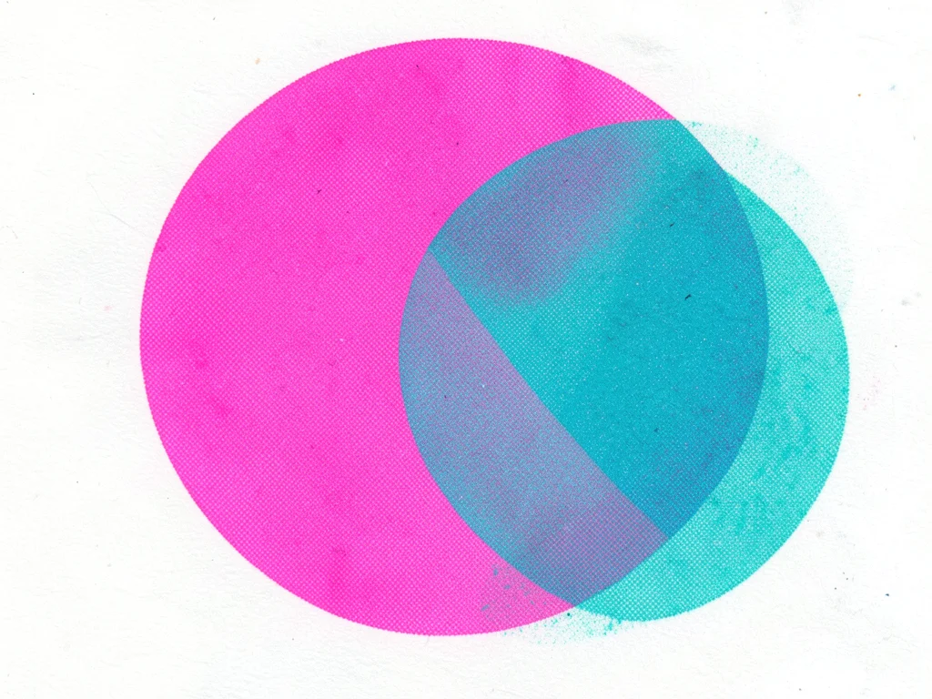 Risograph print of overlapping geometric circles in fluorescent pink and teal, h