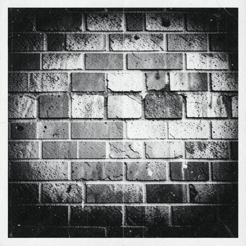 Photocopy of a brick wall, regular pattern degrading into irregular checkerboard