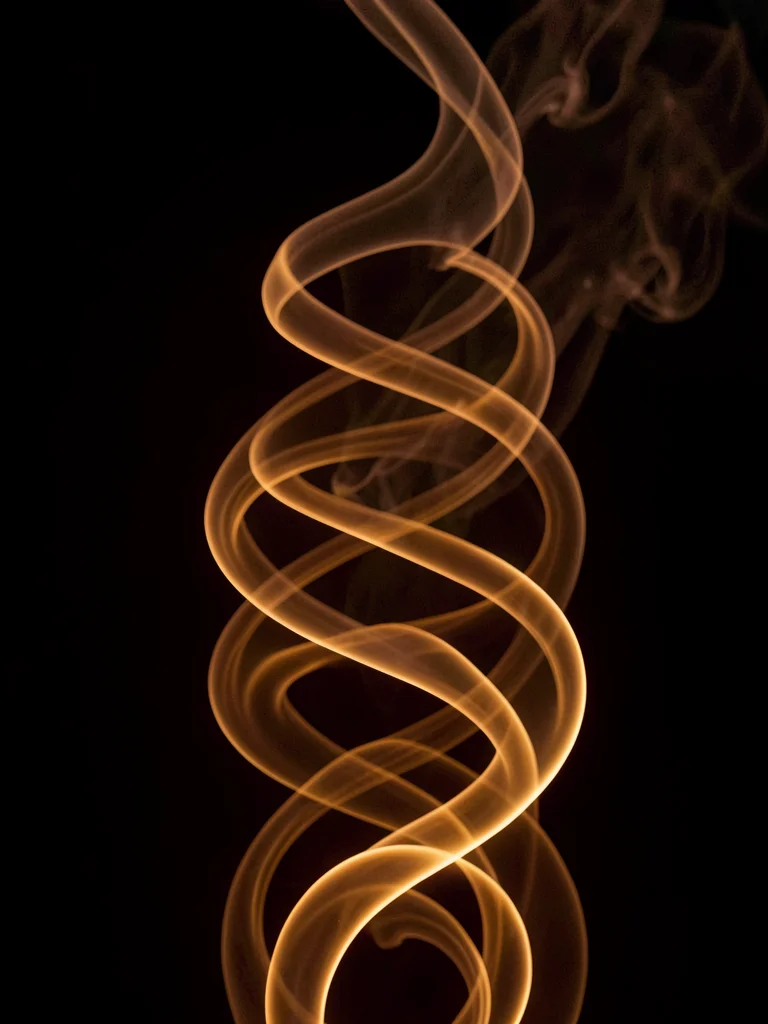 Coffee smell visualized as rising spirals of warm brown and amber