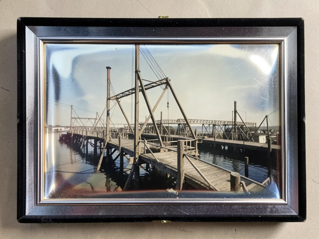 Industrial pier in summer light, metal structures, antiqued photographic feel