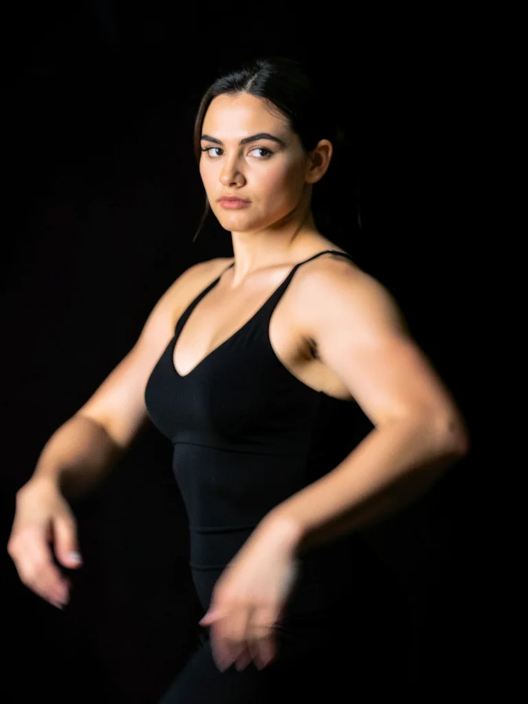 Dancer in thirty-second exposure, single sharp face and blur of limbs