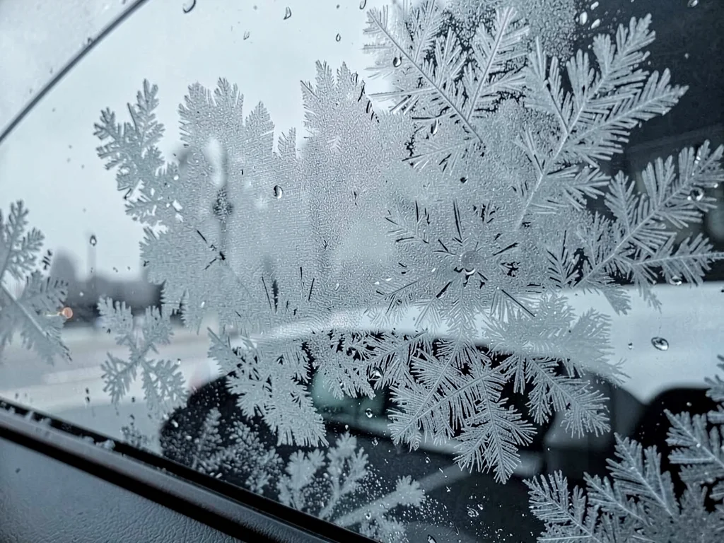 Vehicle windshield overnight frost art