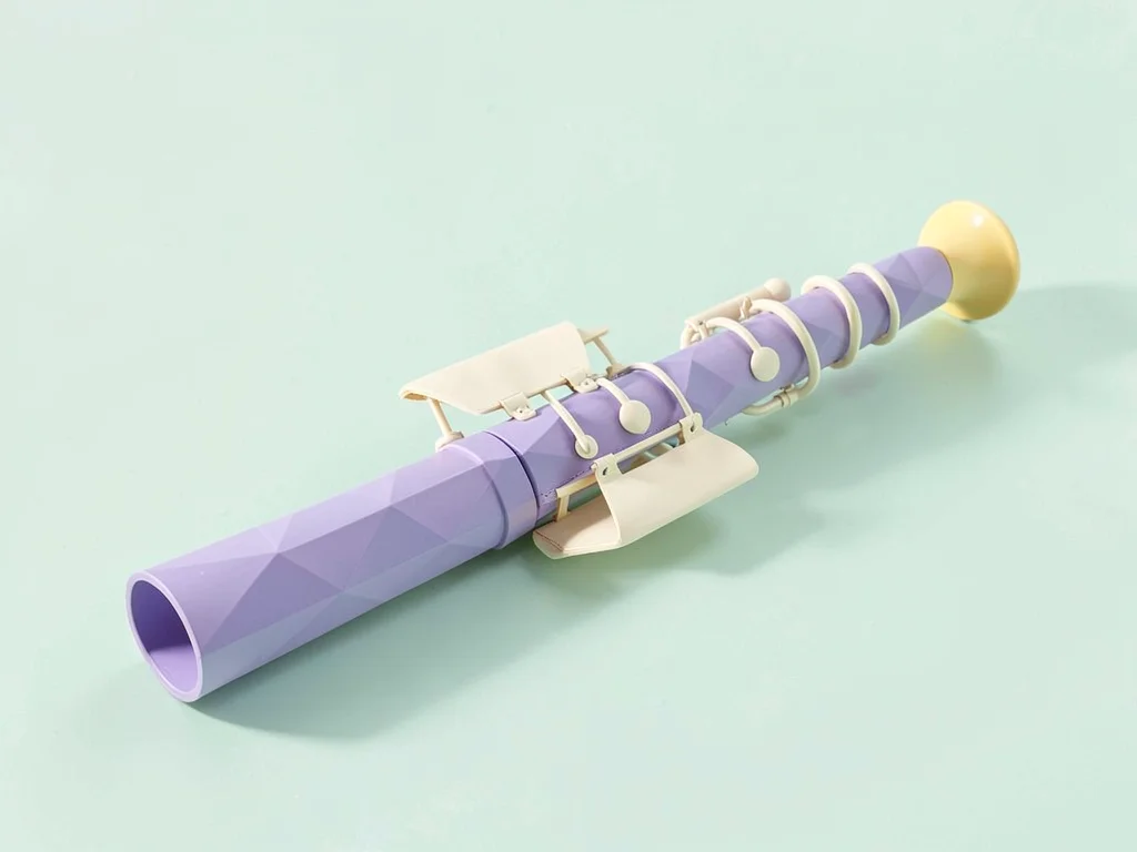 Slim lavender lowpoly flute lying flat with cream key flaps and a butter-yellow 