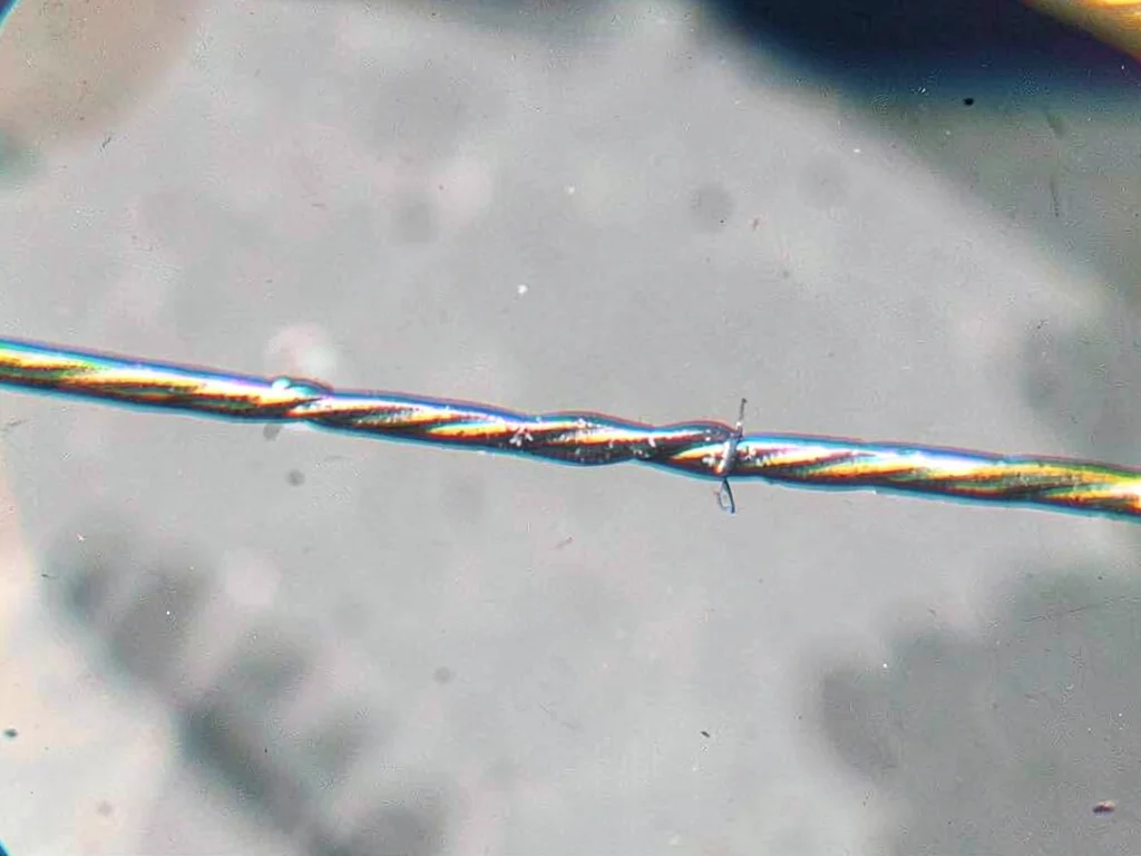 Wire with chromatic aberration visible