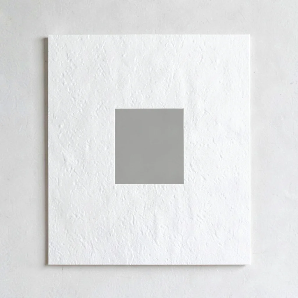 Quote card composition with generous whitespace and an off-center muted swatch (