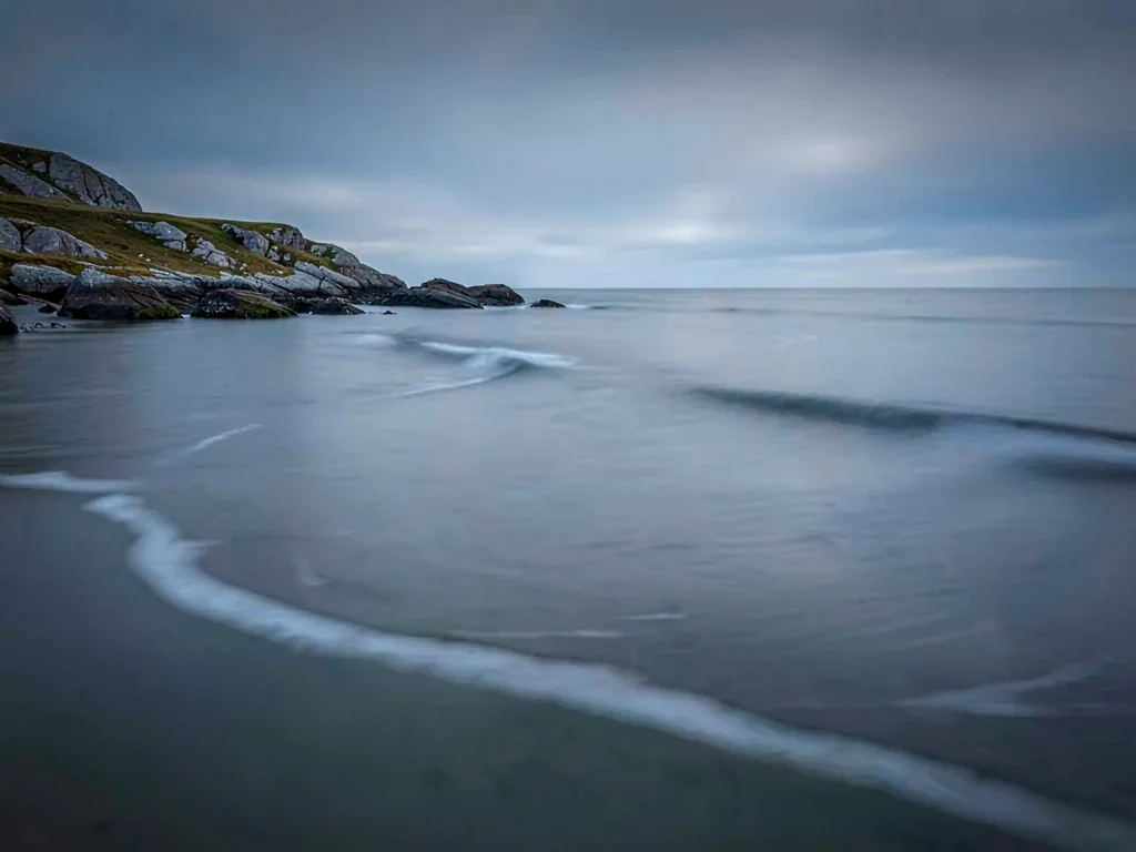 Calm water with subtle current still visible