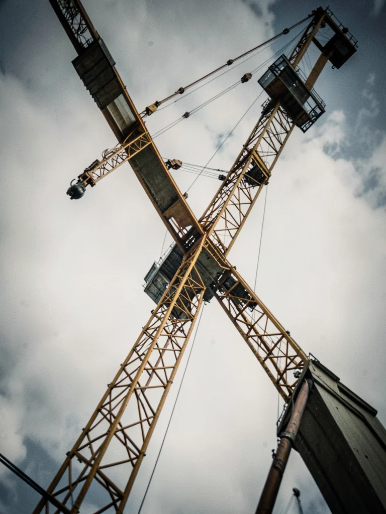 Construction crane from below tilted