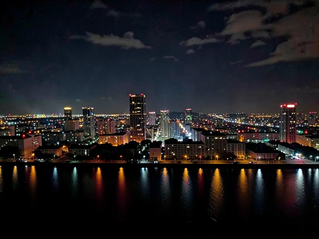City lights coming on