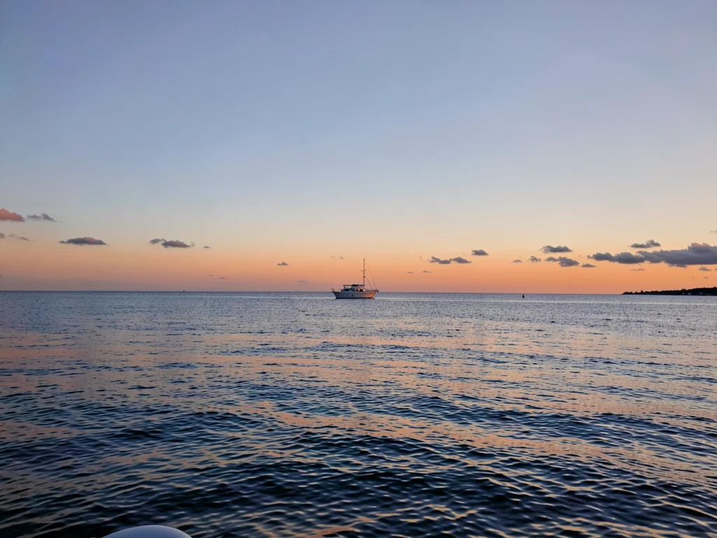 Horizon with dot of boat