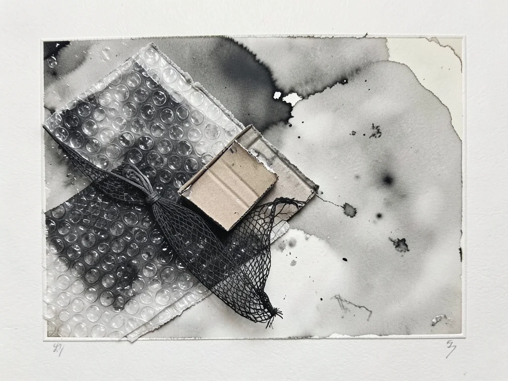 Abstract monoprint made entirely with found objects pressed into ink: bubble wra