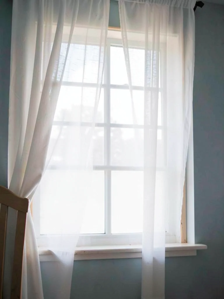 Window with sheer curtain