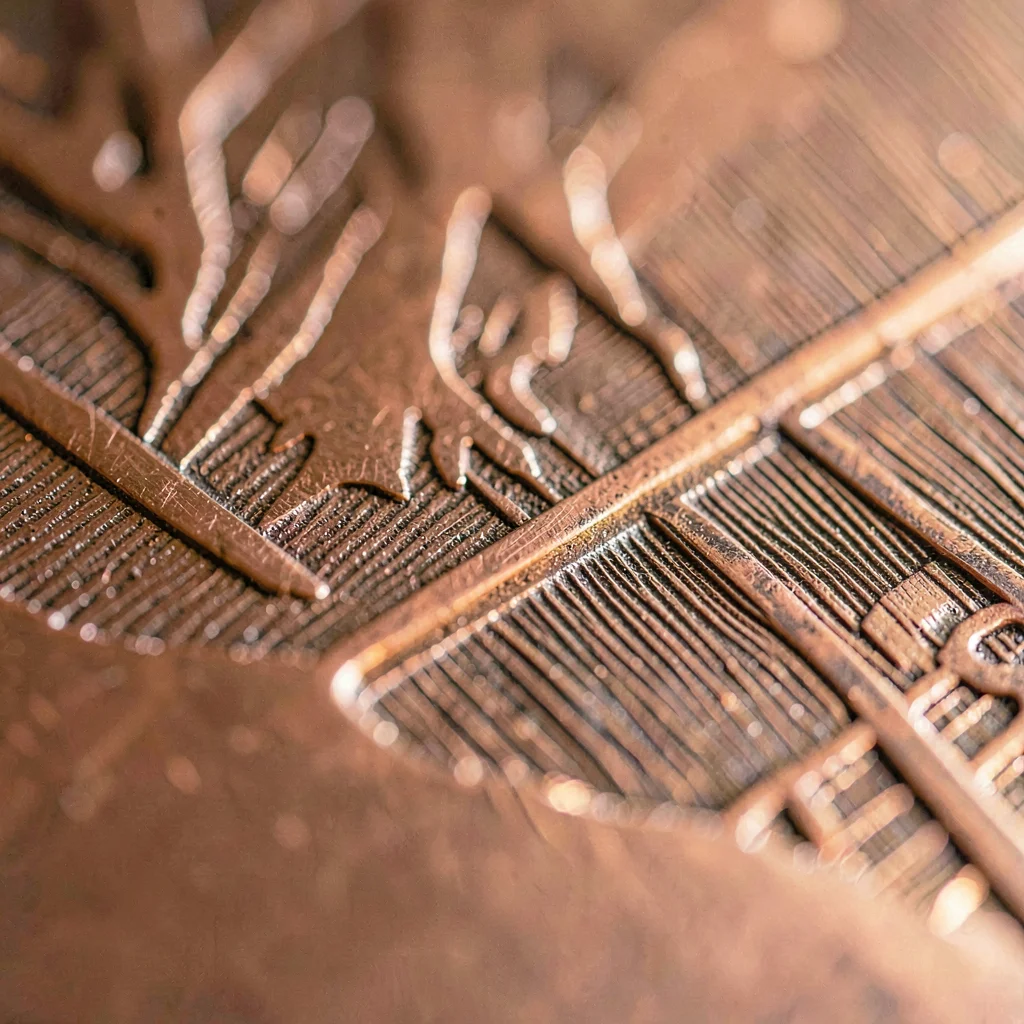 Macro study of a copper etching plate with fine acid-bitten lines