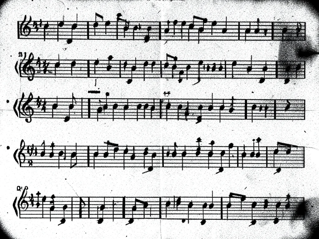 Sheet music photocopied to pure pattern, staff lines and note shapes surviving a