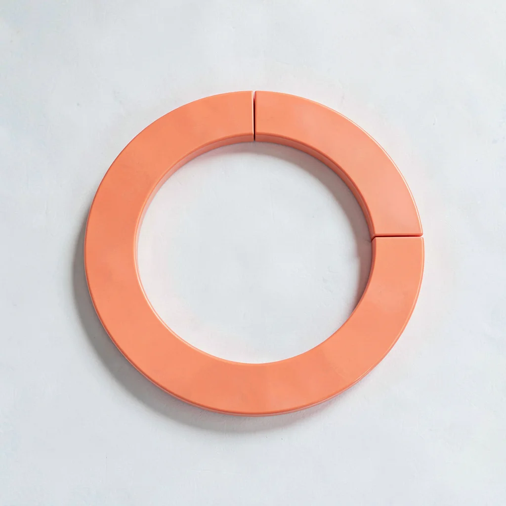 Abstract UI of a savings goal progress ring filled to two-thirds in coral, no te