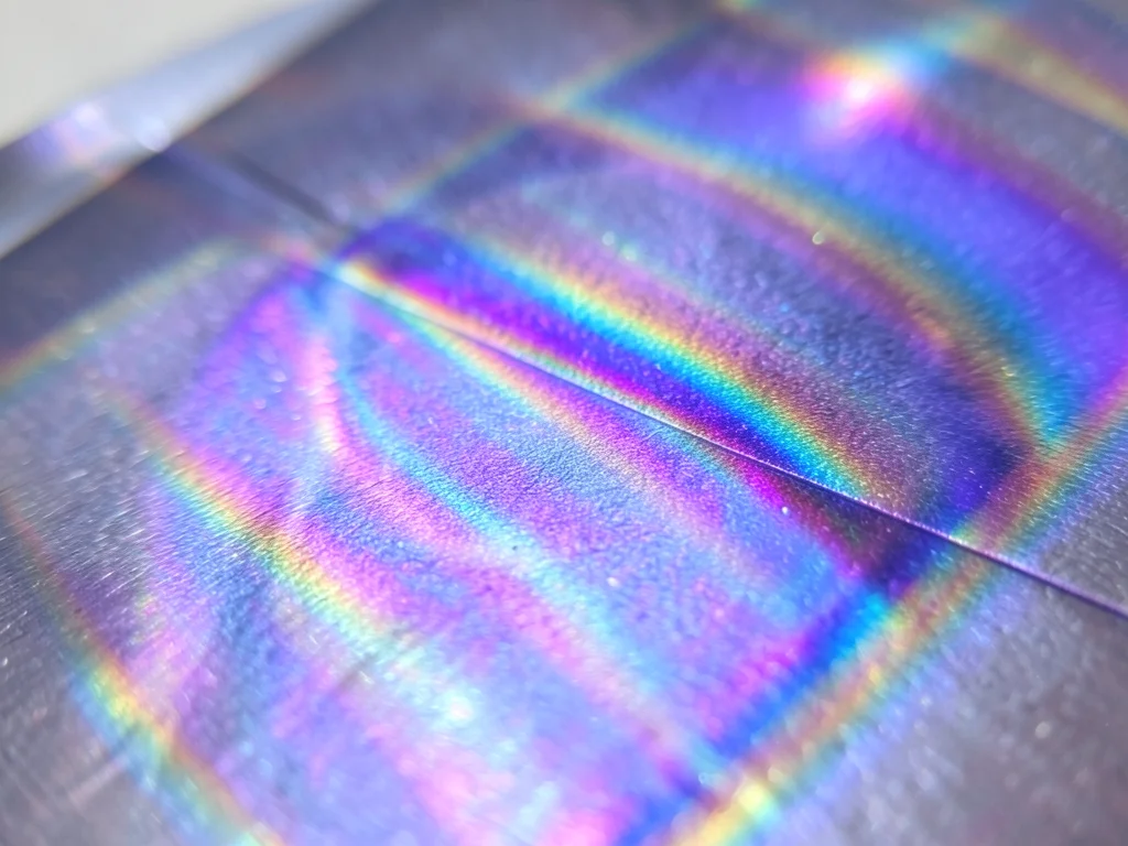 Thin film on anodized titanium, voltage-controlled oxide creating specific inter