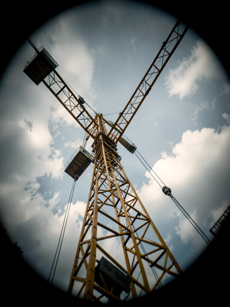 Construction crane from below tilted