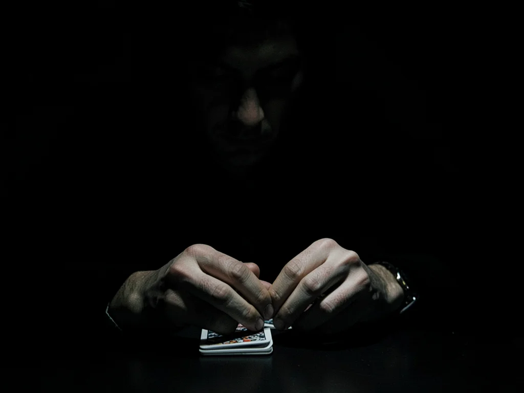Hands shuffling cards
