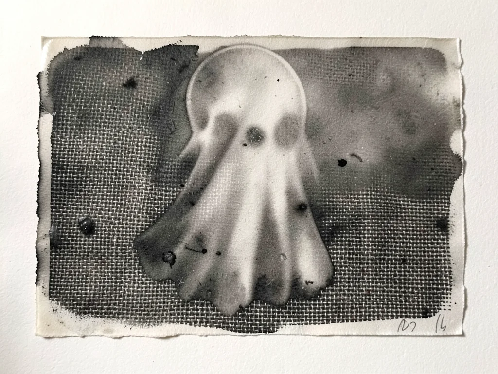 Monoprint with heavy texture from pressing burlap into wet ink, fabric weave pat