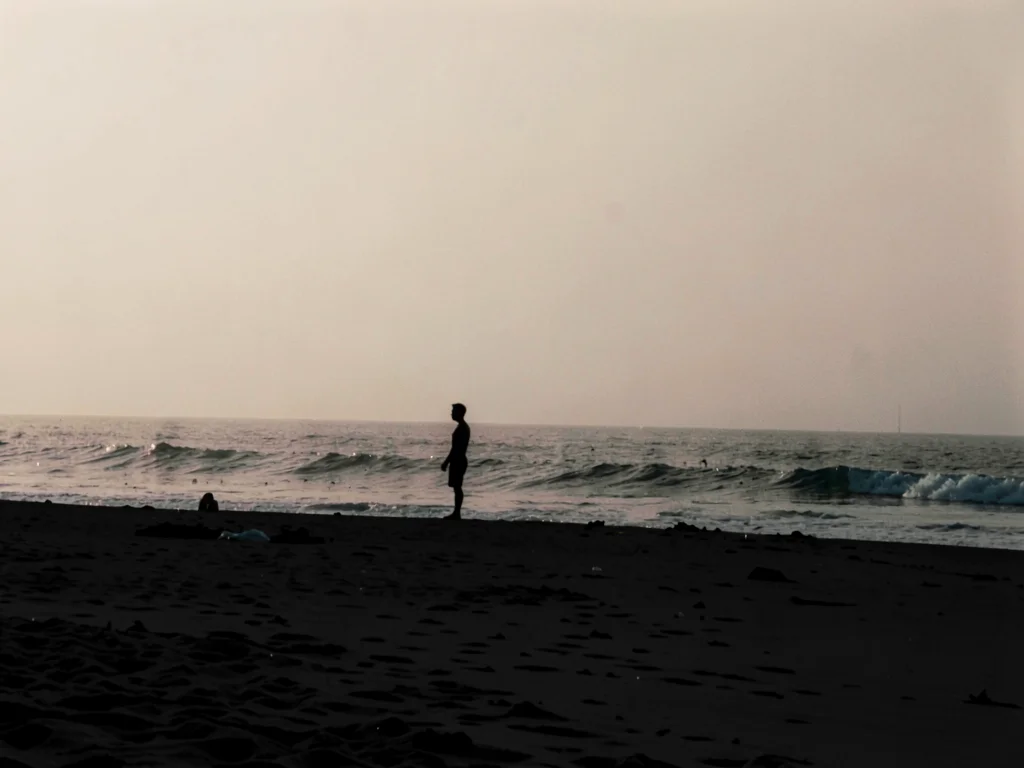 Beach silhouette with haze