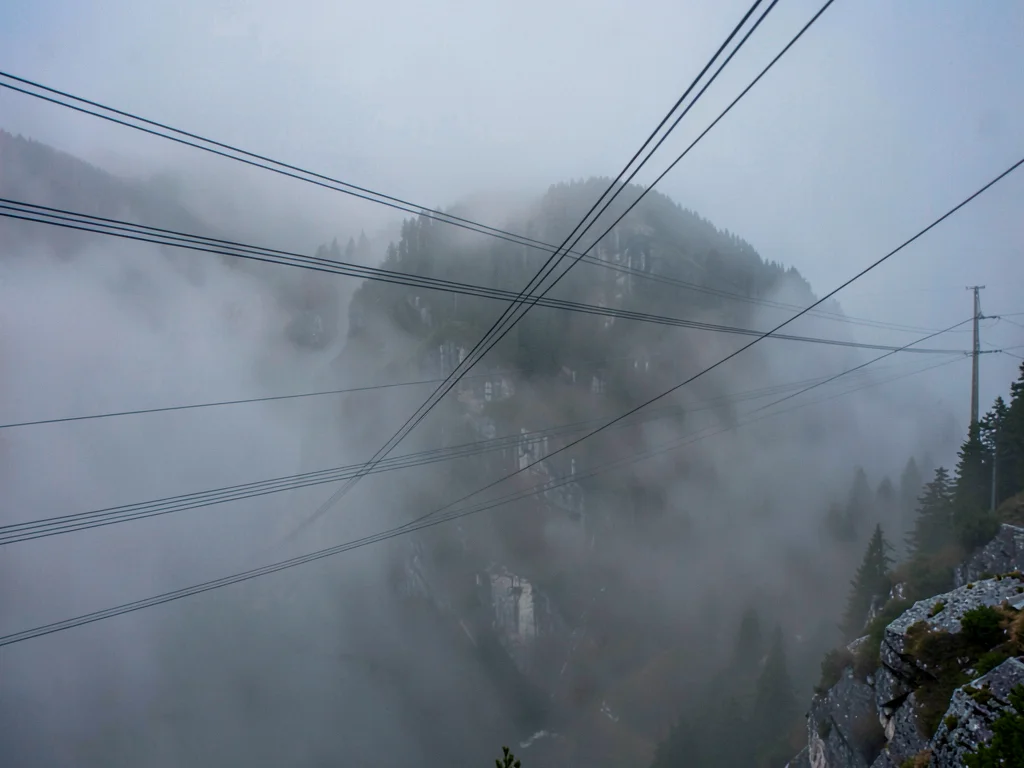 Power lines as geometric element across mist