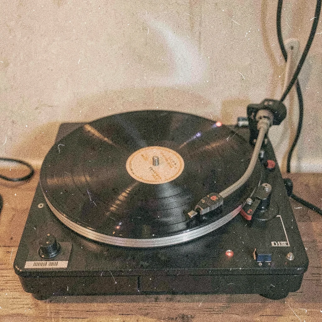 Grainy digital illustration, vinyl record player spinning , film grain texture o