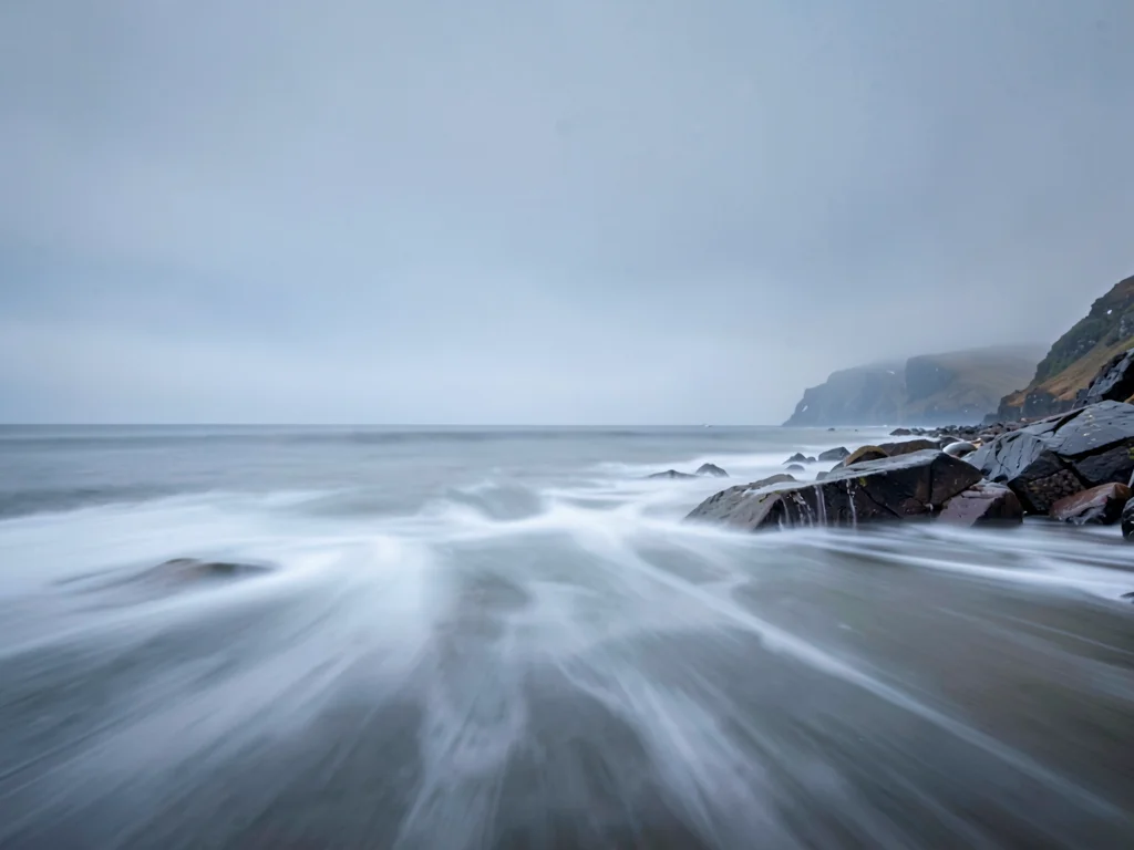 Fog and sea blurring together at horizon