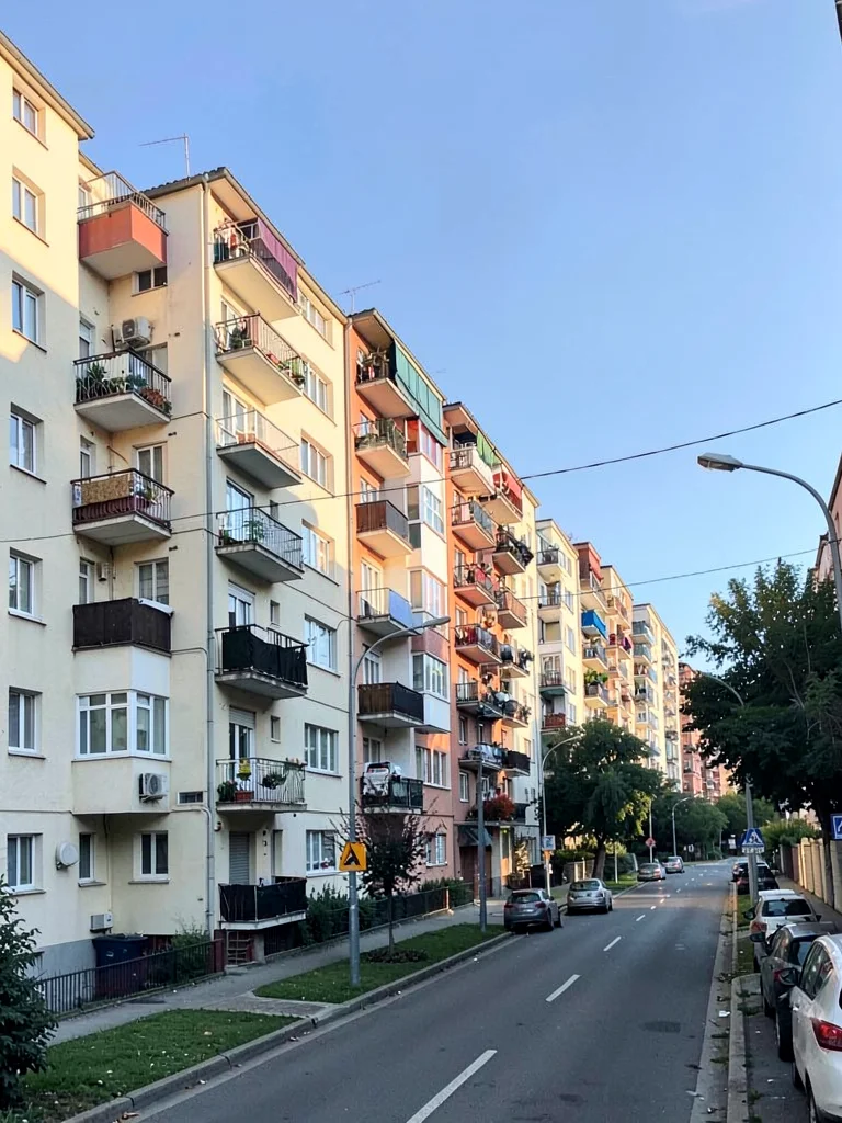 Apartment building facades repeating into distance
