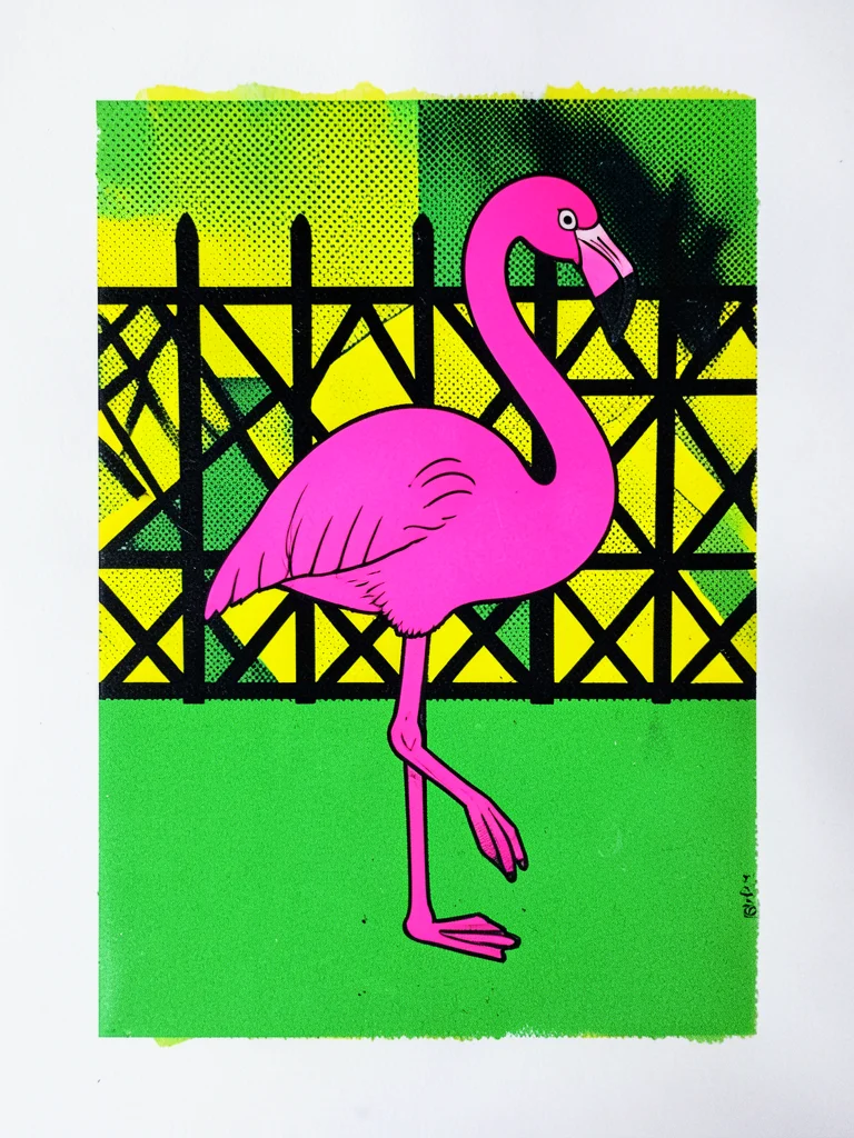 A flamingo lawn ornament in fluorescent pink standing on one leg, on a lawn of f