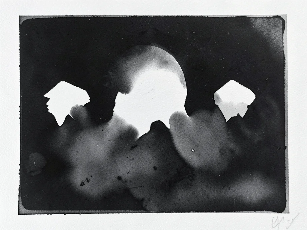 Monoprint with stencil resist, cut paper shapes blocked ink creating sharp white