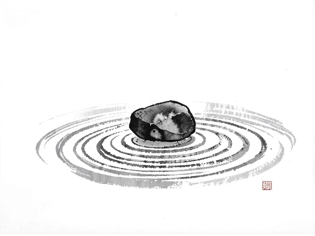 One stone on raked pattern surrounded by nothing