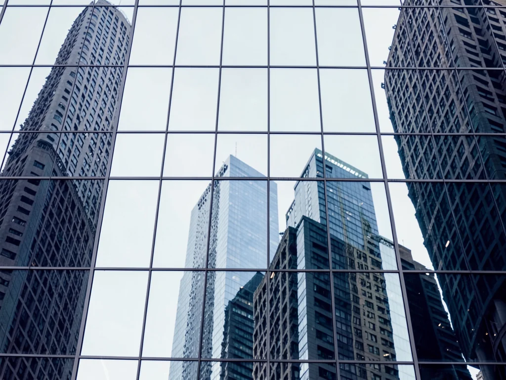 Multiple tower reflections creating gradient collage