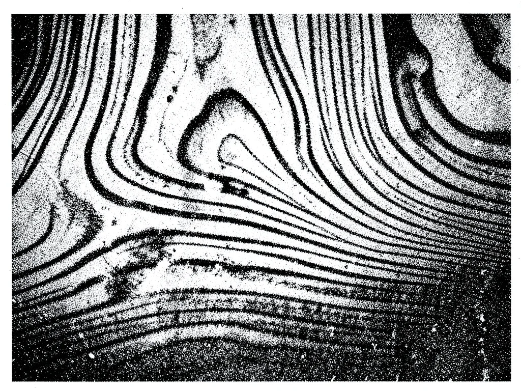 Photocopy of wood grain, the pattern exaggerated and simplified through toner re